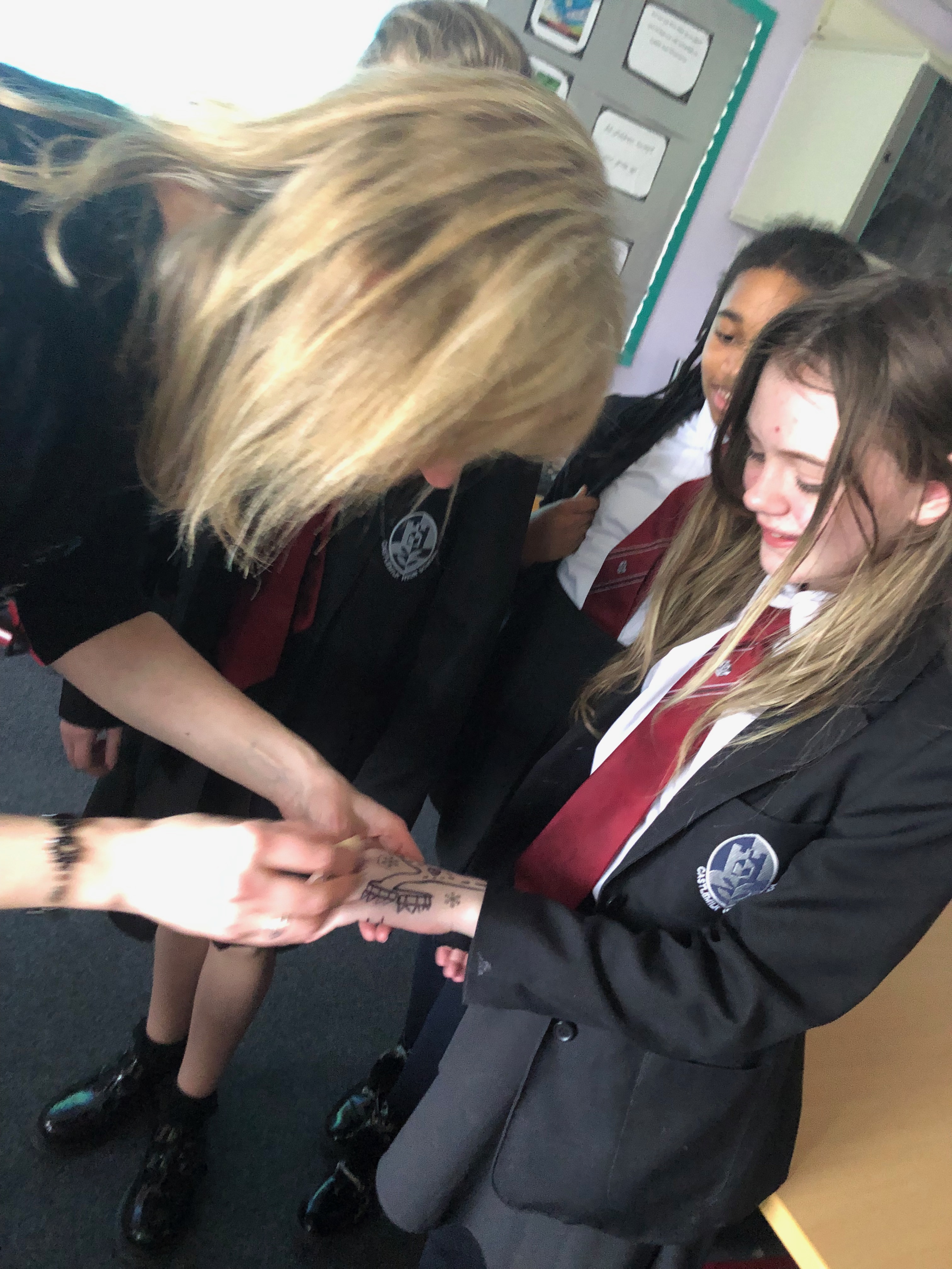 Author L.J. MacWhirter and her black snowflake stamp